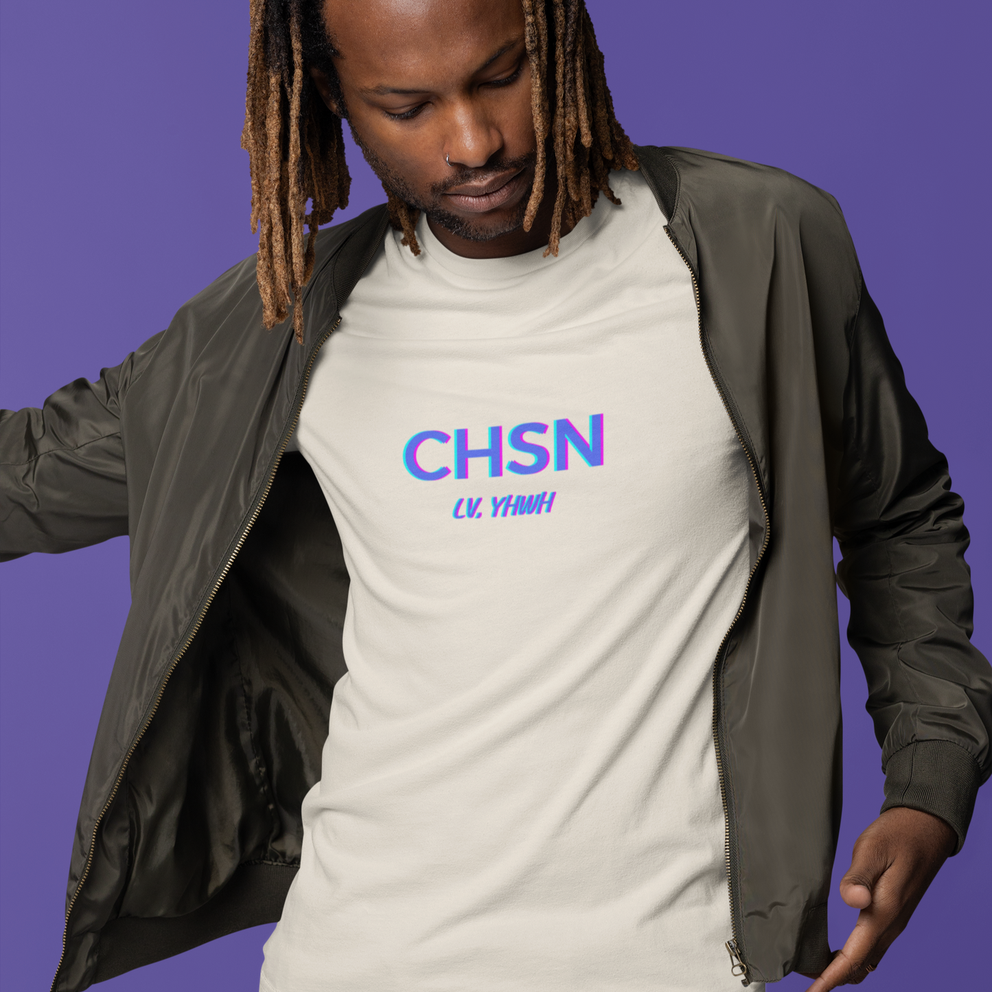 Printify Christian graphic tee on male model with CHSN multicolor chest print and olive jacket